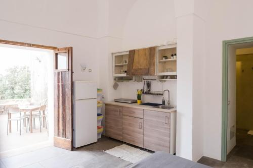 Una cocina o zona de cocina en Il Mulino di Scauri
