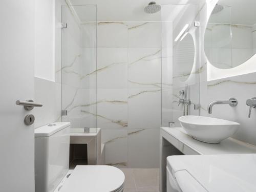 Kúpeľňa v ubytovaní Nexus Downtown Apartment