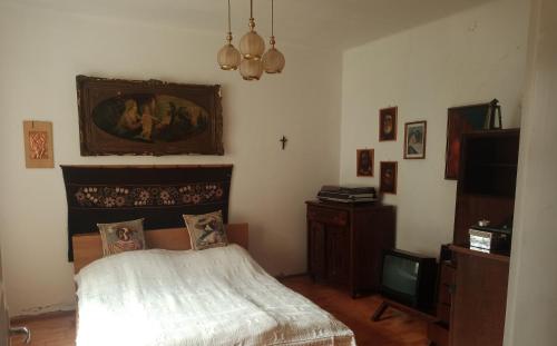 Posteľ alebo postele v izbe v ubytovaní Sárga Katica Vendégház