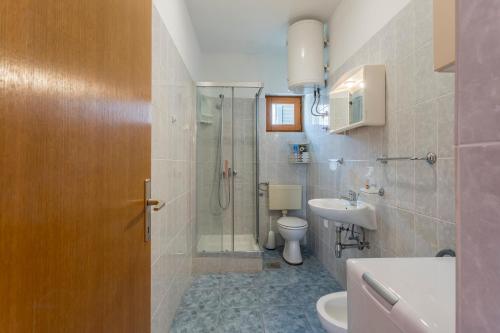 Kúpeľňa v ubytovaní Apartmani Prkačin