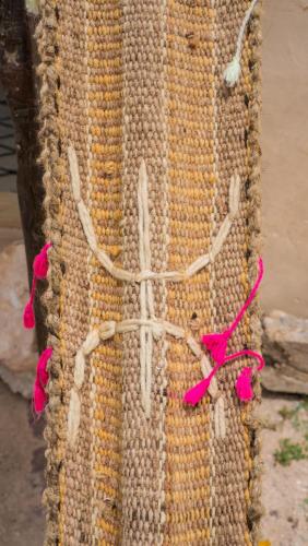 a close up of a beehive with pink ribbon at Berber Beldi Camp in Imsouane
