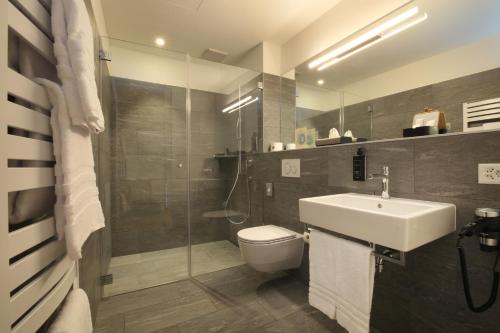 Koupelna v ubytování Charme Hotel al Torchio