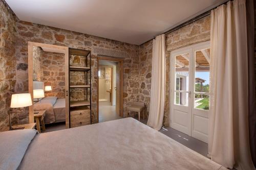 Ένα ή περισσότερα κρεβάτια σε δωμάτιο στο Villa Morisca