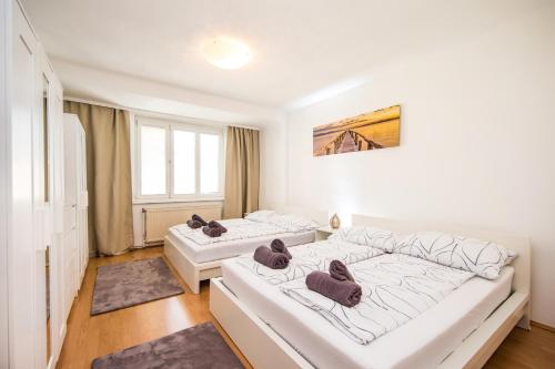 Postel nebo postele na pokoji v ubytování Lovley central Vienna apartment with balcony
