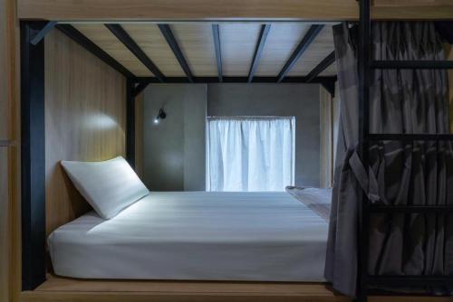 9 Hostel and Barにあるベッド