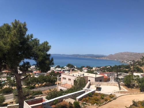 a view of a town with a lake at Karpathios Studios Pefkos in Pefki Rhodes