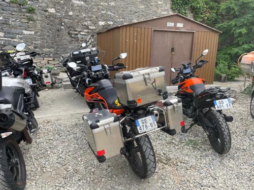 a row of motorcycles parked next to each other at Hôtel U Passa Tempu in Corte