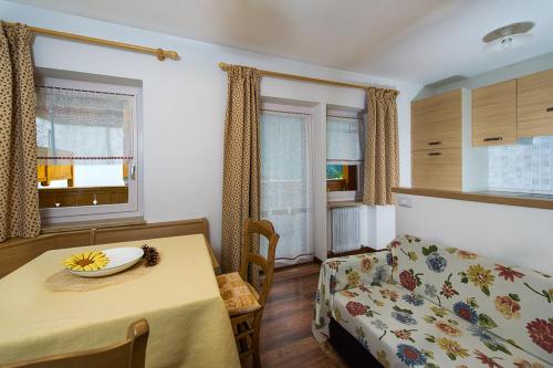 Postel nebo postele na pokoji v ubytování Majon Vajolet - Apartments Luisa