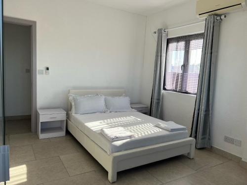 En eller flere senge i et værelse på Ibis Tourist Residence 1