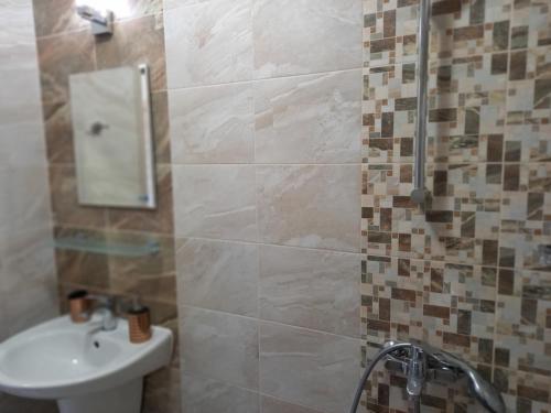 Phòng tắm tại вила ФЛОРА