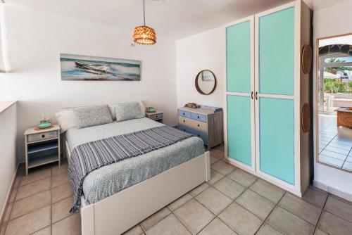 En eller flere senge i et værelse på Lanzahost Casa Christina