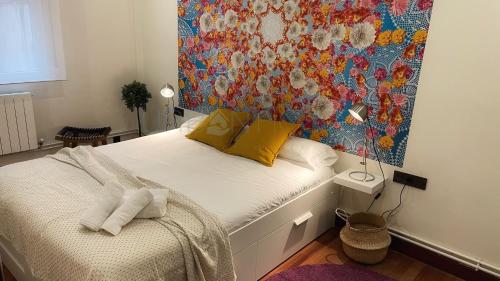 Postel nebo postele na pokoji v ubytování Vivienda Turística Urbana en Santuchu, Cómoda, Funcional y con Parking