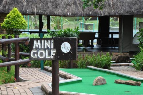 a mini golf sign in front of a resort at Legend Safaris 257A - in Kruger Park Lodge in Hazyview