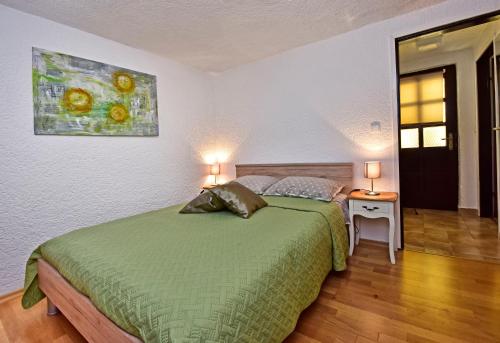 Postel nebo postele na pokoji v ubytování Apartment Corta City-Centre