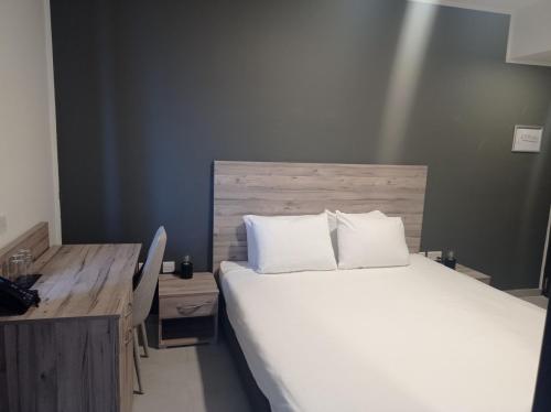 Una cama o camas en una habitación de Hotel VIU57