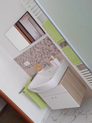 a bathroom with a sink on a counter at Da Valentina in Castelfondo