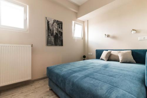 Posteľ alebo postele v izbe v ubytovaní Panorama Apartment