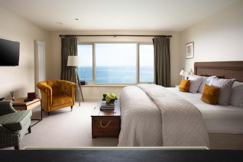 Ένα ή περισσότερα κρεβάτια σε δωμάτιο στο The Lewinnick Lodge