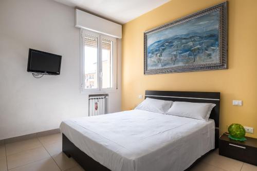 Voodi või voodid majutusasutuse Bergonzoni Modern Apartment by Wonderful Italy toas