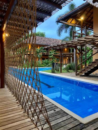 Kolam renang di atau dekat dengan Pousada Vila do Dengo