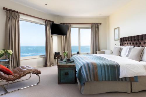 Ένα ή περισσότερα κρεβάτια σε δωμάτιο στο The Lewinnick Lodge