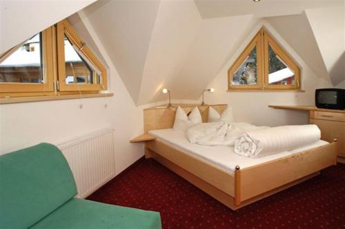 Ένα ή περισσότερα κρεβάτια σε δωμάτιο στο Hotel Kristall B&B