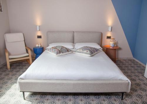 Moncrivel Rooms & Relax 객실 침대