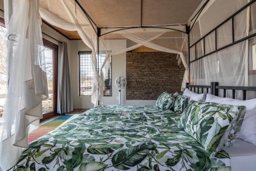 מיטה או מיטות בחדר ב-Hohenstein Lodge