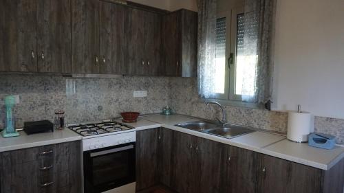 Kitchen o kitchenette sa Oasis house - for relaxing holidays near the beach