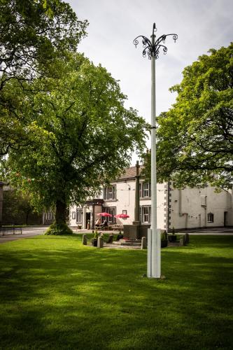 Un jardín fuera de Maypole Inn