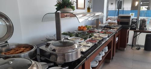 a kitchen with a bunch of food on a counter at Pamukkale Batu Termal in Pamukkale