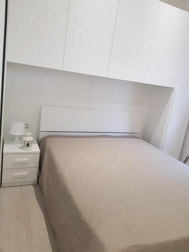 Ένα ή περισσότερα κρεβάτια σε δωμάτιο στο Casa Gelsomino