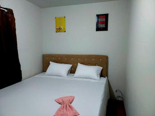 Uma cama ou camas num quarto em Apartamento próximo ao Autódromo.