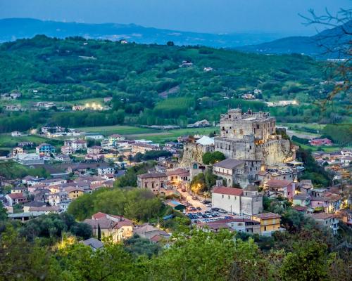 a cityscape of a town with a castle at Castello di Limatola in Limatola