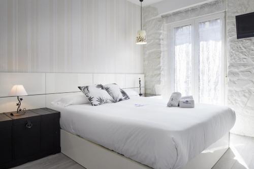 Posteľ alebo postele v izbe v ubytovaní Ordulari - Basque Stay