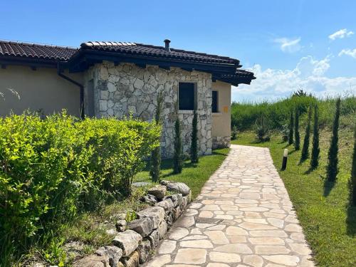 A garden outside Private Villa at BlackSeaRama Golf & Villas Resort