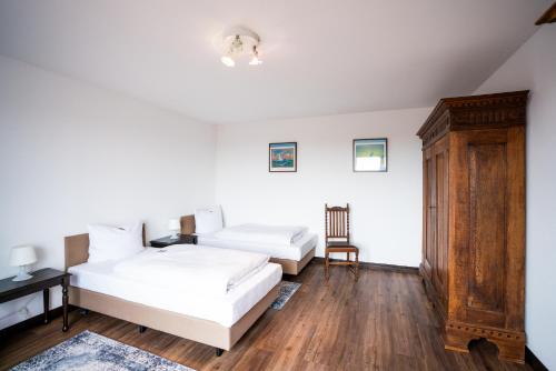 Postel nebo postele na pokoji v ubytování Hotel Am Kamp