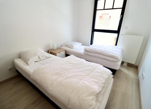 Posteľ alebo postele v izbe v ubytovaní Maison bleue - Apt 4 pers, 2 chambres, prox marché