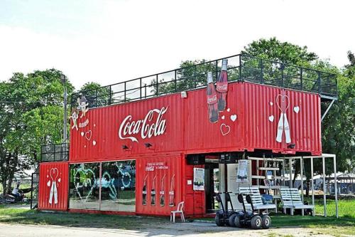 a coca cola store with a red building at Sekinchan 2008 Home：Karaoke/BBQ in Sekincan
