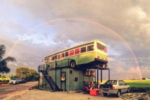 a double decker bus sitting on top of a building at Sekinchan 2008 Home：Karaoke/BBQ in Sekincan