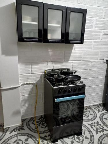 Kuchyň nebo kuchyňský kout v ubytování Apartamento Santorini Colombiano