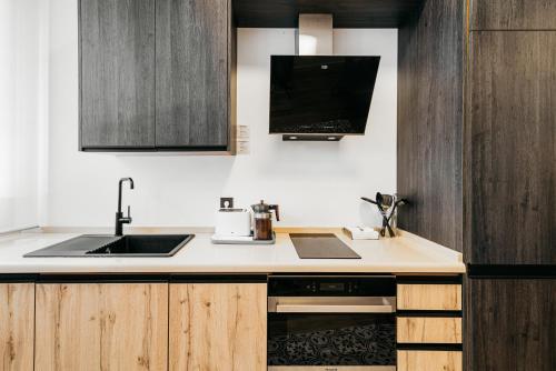 Kuchyň nebo kuchyňský kout v ubytování Apartamento Macarena junto a la Basílica de la Macarena