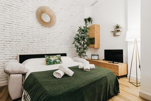 Postel nebo postele na pokoji v ubytování Apartamento Macarena junto a la Basílica de la Macarena