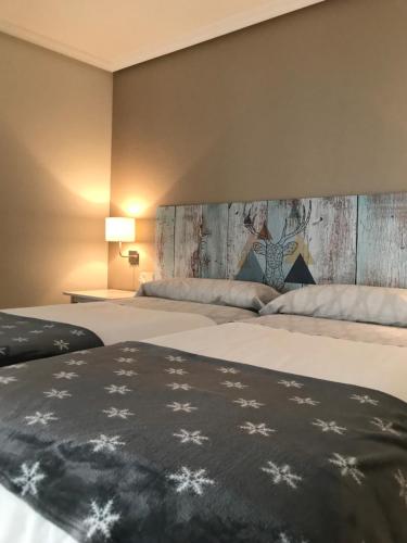 Postel nebo postele na pokoji v ubytování Apartamento Estiviellas, Pirineo