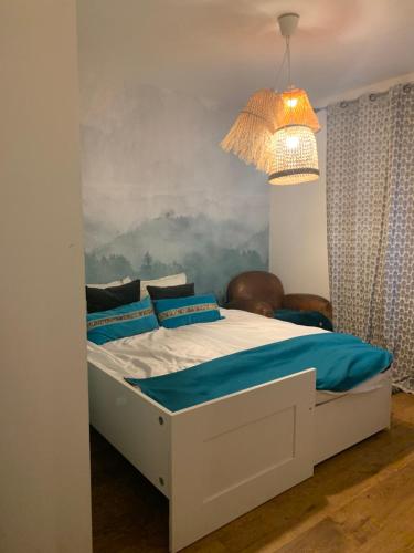 Giường trong phòng chung tại Villa aux Palmiers,Piscine 28°,Pétanque,Coeur Bassin