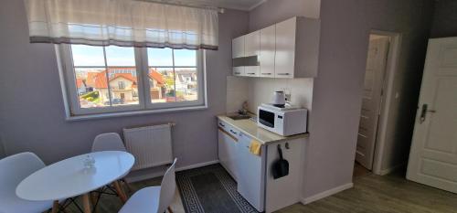 Dapur atau dapur kecil di Apartamenty Hexagon nr 26