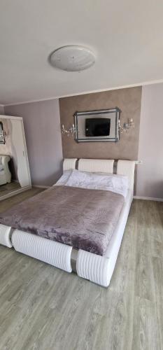 Katil atau katil-katil dalam bilik di Apartamenty Hexagon nr 26