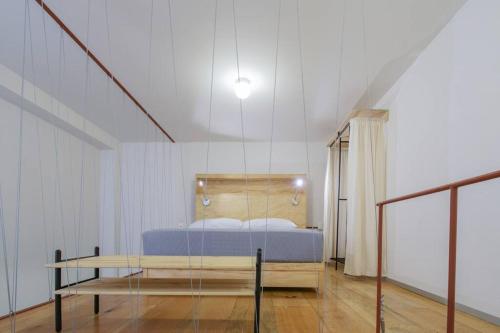 En eller flere senge i et værelse på 103 SUITE DONCELES C/TAPANCO, CENTRO HISTÓRICO CDMX