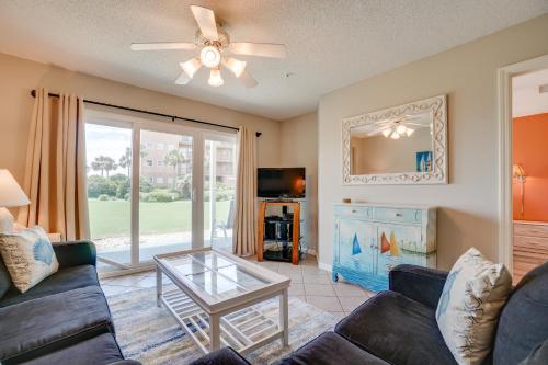 a living room with a couch and a glass table at Ciboney Condominiums by Panhandle Getaways in Destin