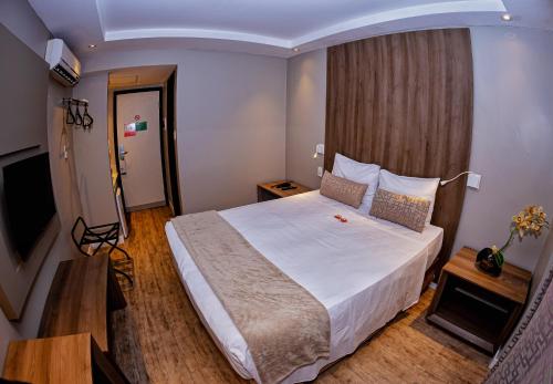Transfer (aeroporto).cls-2{fill:#ff8000}.cls-3{fill:#febb02}.cls-5{fill:#c00}.cls-7{fill:#514d9e}Travel Proud The Hotel Menor preço em Transfer (aeroporto).cls-2{fill:#ff8000}.cls-3{fill:#febb02}.cls-5{fill:#c00}.cls-7{fill:#514d9e}Travel Proud The Hotel